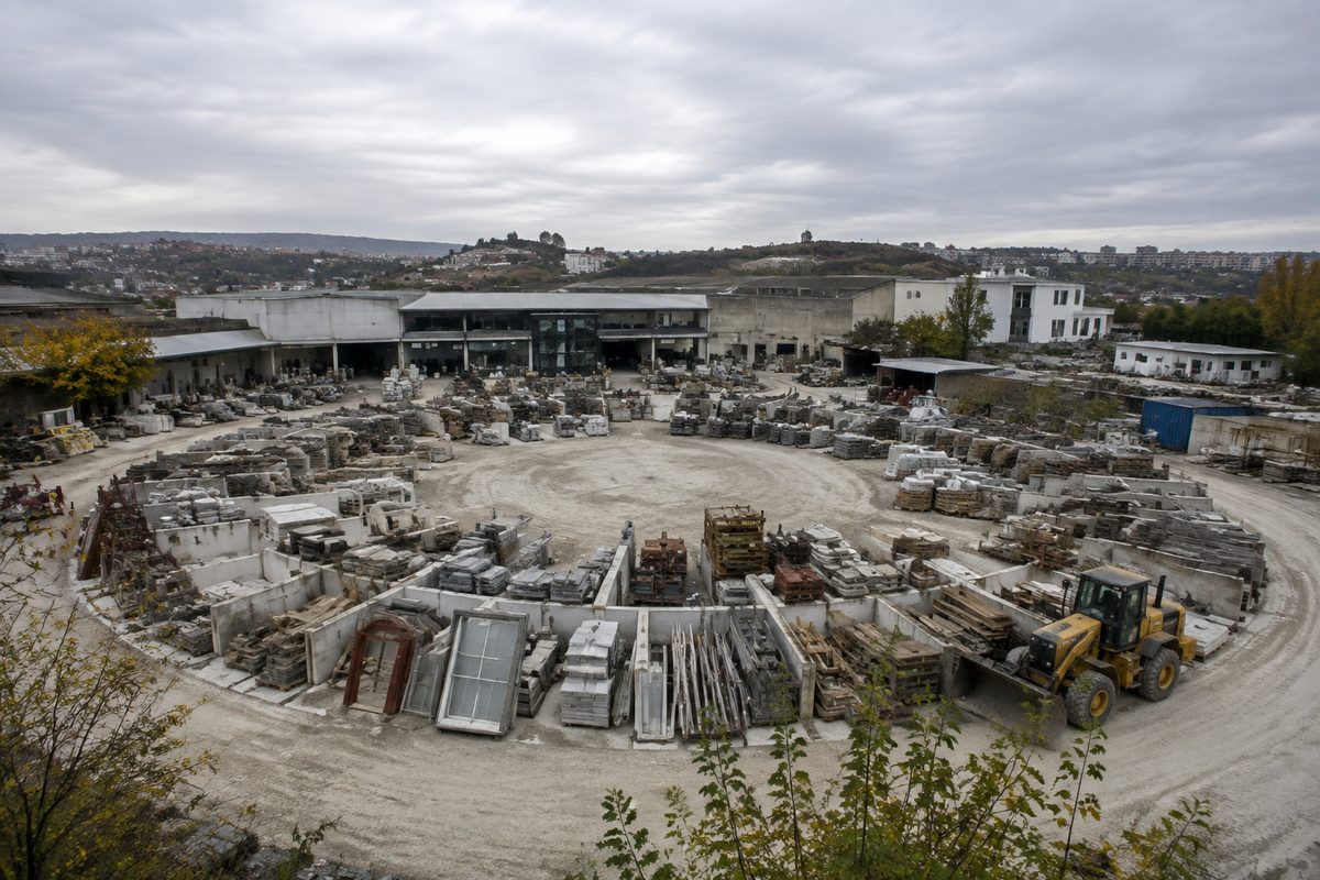 Circular construction yard with shared infrastructure for community delivery