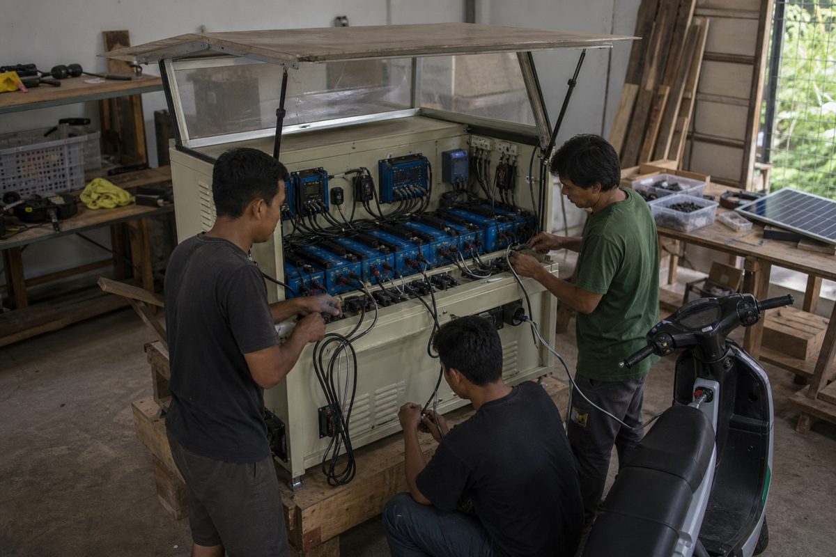 Village charging station arranged at a small business service area in Indonesia