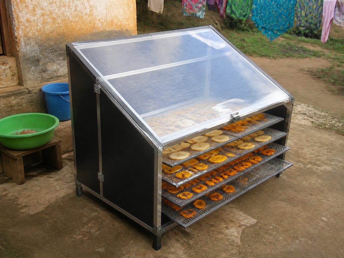 Solar fruit dryer with related small tools and materials nearby