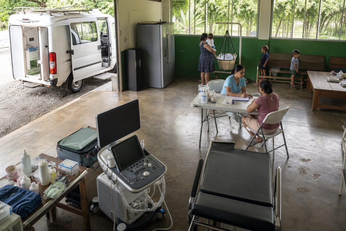 Mobile maternal health unit shown inside a working local workshop